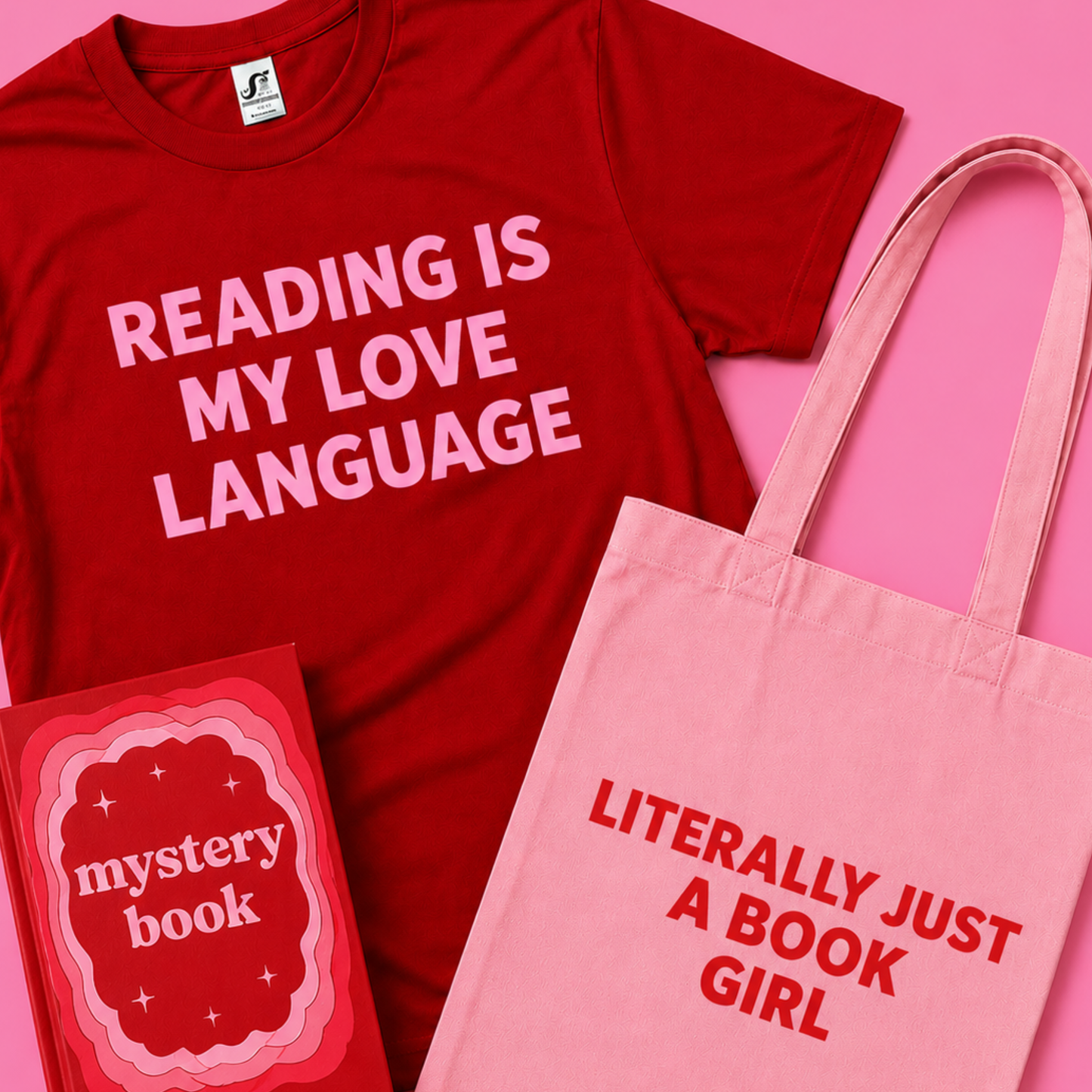 Red t-shirt with 'Reading is my love language' text, pink tote bag with 'Literally just a book girl' text, and red book with 'mystery book' text on a pink background.