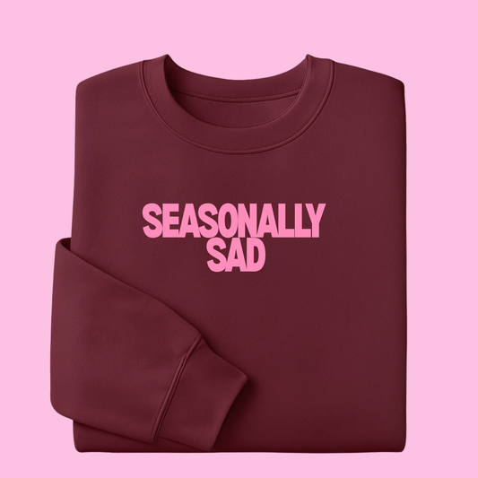SEASONALLY SAD SWEATER