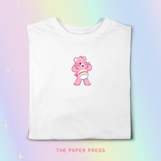 Pink retro bear graphic t-shirt with rainbow belly design on a cotton tee inspired by 90s nostalgia.