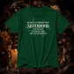 A dark green short-sleeve t-shirt with white text reading 'NO MAGIC IS STRONGER THAN SISTERHOOD. CAST BY FATE, TESTED BY TIME, AND NEVER BROKEN.