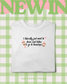 White cotton t-shirt with “I literally just want to drink iced lattes & go to bookshops” slogan and iced coffee illustrations, hand printed by The Paper Press
