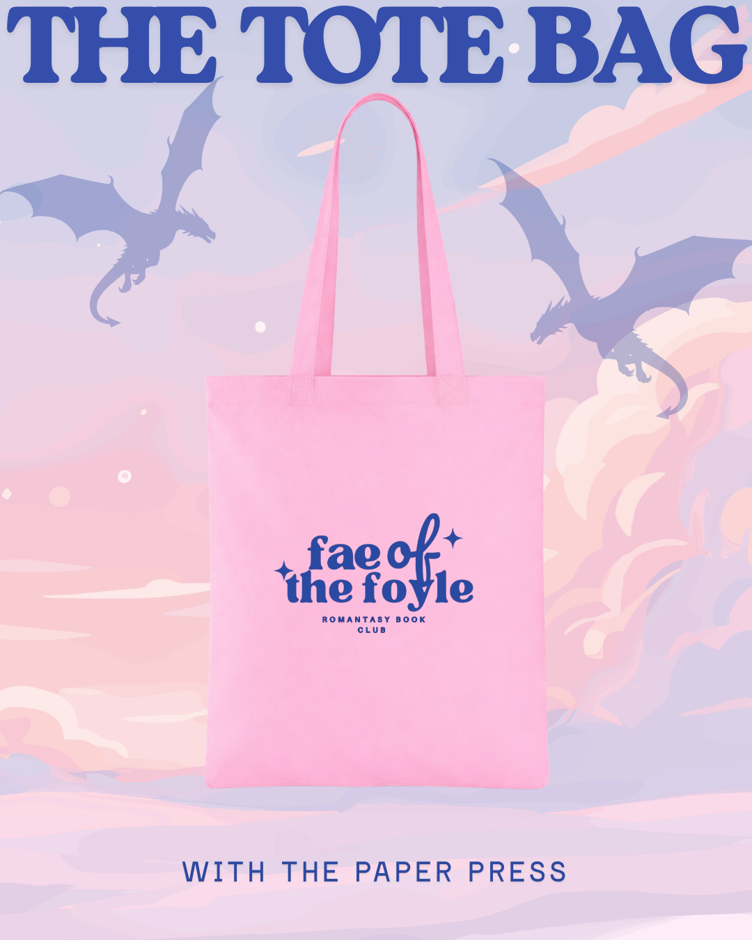 Pink tote bag with 'fae of the foyle' logo against a pastel sky with dragons