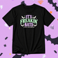 Black Halloween T-shirt with pastel lilac, mint green and cream “It’s Freakin’ Bats, I Love Halloween” slogan, featuring retro bat and star details.