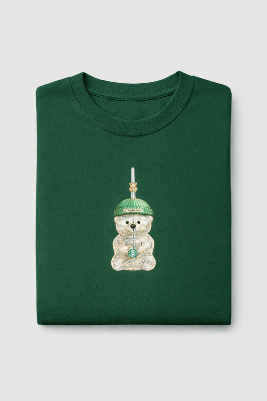 Bottle green folded t-shirt with small Starbears bear cup illustration printed at the centre of the chest
